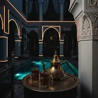 براد ديال أتاي وكيسان فوق صينية نحاس، فرياض فالليل قدّام صهريج مضوّي